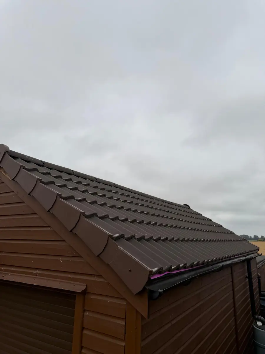 Garage roof in Redland 49 tile and a torch-on felt summer house roof, image 6
