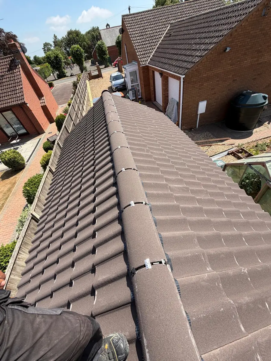 Garage roof in Redland 49 tile and a torch-on felt summer house roof, image 5