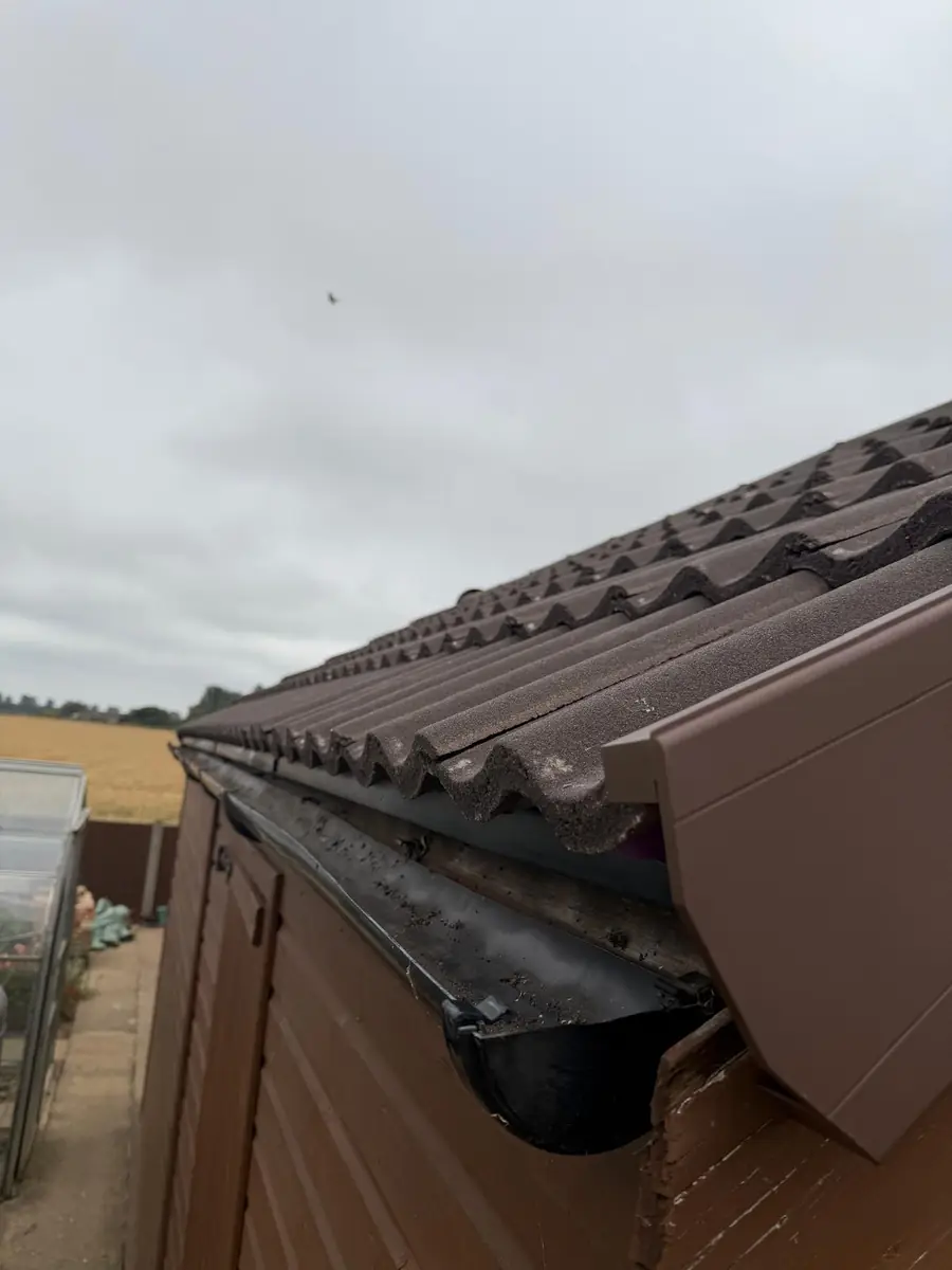 Garage roof in Redland 49 tile and a torch-on felt summer house roof, image 8