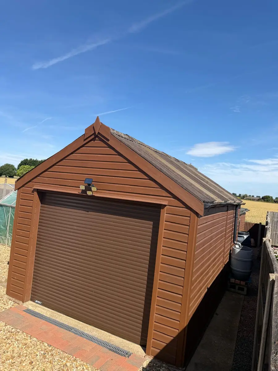 Garage roof in Redland 49 tile and a torch-on felt summer house roof, image 19