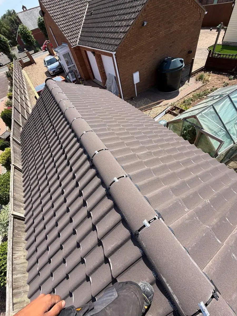 Garage roof in Redland 49 tile and a torch-on felt summer house roof, image 3