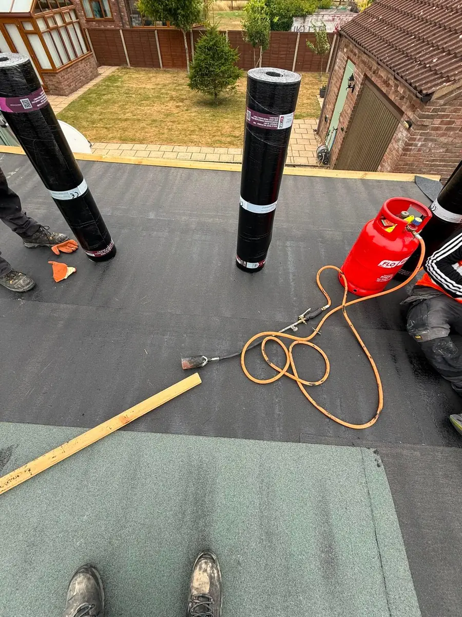 Garage roof in Redland 49 tile and a torch-on felt summer house roof, image 16