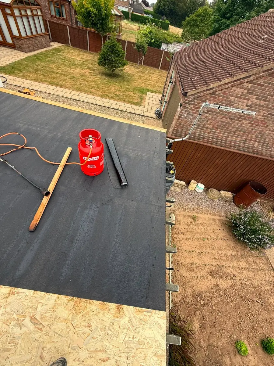 Garage roof in Redland 49 tile and a torch-on felt summer house roof, image 14