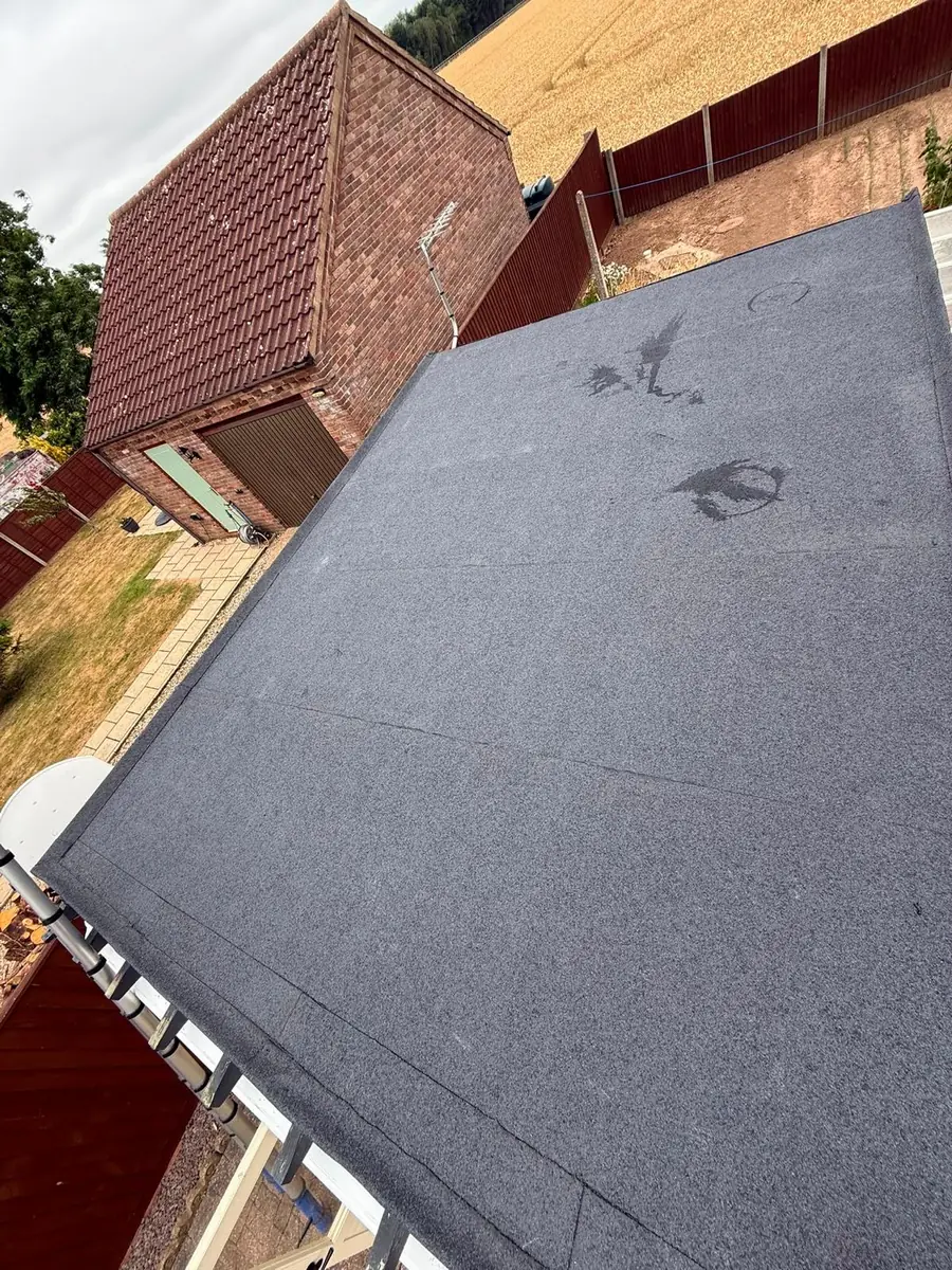 Garage roof in Redland 49 tile and a torch-on felt summer house roof, image 10